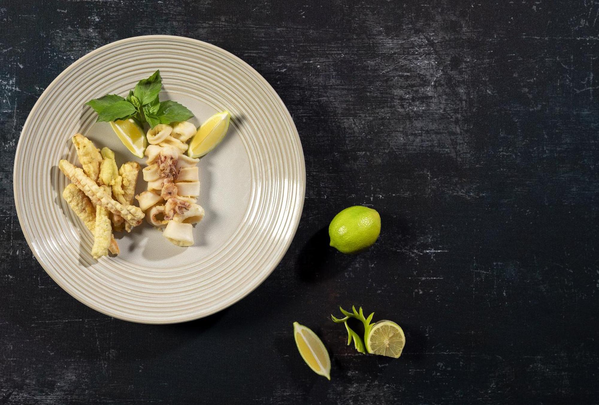 Moevenpick Resort & Marine Spa Sousse Bagian luar foto A plate of raw cuttlefish